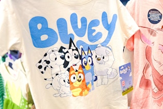 Lifestyle image of toddler wearing a Bluey t-shirt