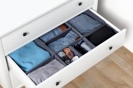 Drawer organizer with clothes in it