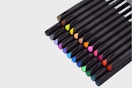 24 journal pens on a grey background