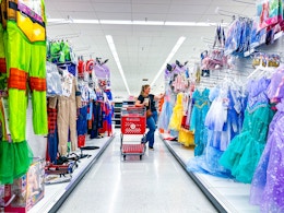 target costumes with a woman and cart in aisle