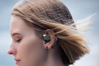 woman wearing Language Translator Earbuds