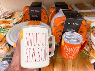 variety of Rae Dunn fall tumblers with sayings on them