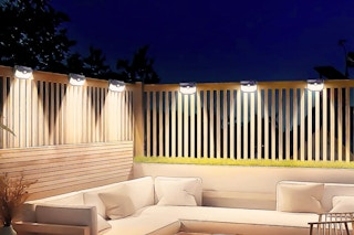 Lifestyle image of the Tolsprint Solar Light 6-pack installed on fence