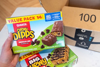 Quaker granola bars next to an amazon box