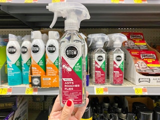 walmart stem bug spray hand holding