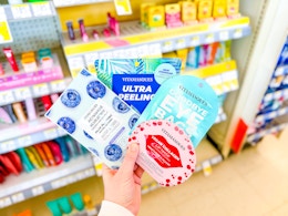 hand holding vitamasques skincare products in walgreens