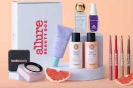 The June Allure Beauty Box Is $10: Buxom, Huda Beauty, and More ($190 Value) card image