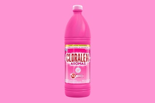 a pink bottle of bleach on a pink background