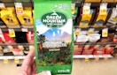 hand holding green mountain coffee