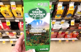 hand holding green mountain coffee