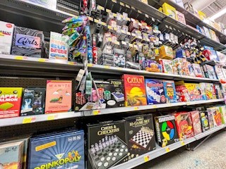 the Walmart aisle with party games and card games
