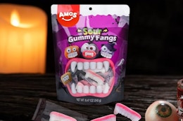 Amos Gummi Vampire Teeth Halloween Candy sitting on a tabletop.