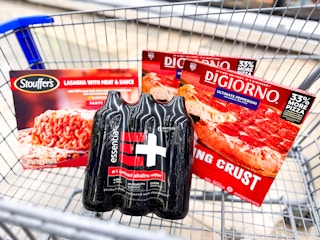 stouffers lasagna essentia water and two digiorno pizzas in walmart cart