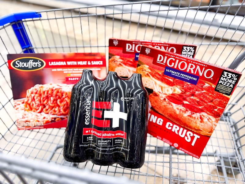 stouffers lasagna essentia water and two digiorno pizzas in walmart cart