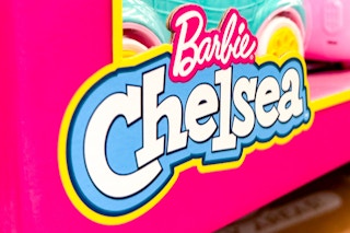 Close up shot of Barbie Chelsea Logo on toy packaging from Walmart
