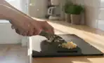 a small cutting board on a counter