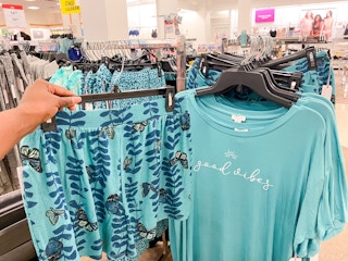 someone holding up a pair of pajama shorts next to pajama shorts in jcpenney