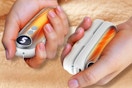 Person holding the Funaudio Hand Warmers Rechargeable 2 Pack in hand.