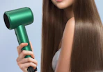 a person holding a green hair dryer