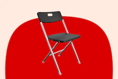 Stock image of the black Mainstays folding chair