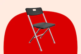 Stock image of the black Mainstays folding chair