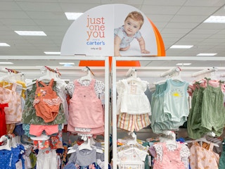 A display of Carter's Just One You baby clothing inside Target.