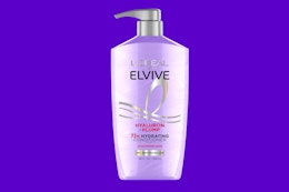 a purple pump bottle of conditioner