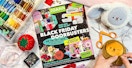 The Joann Fabrics Black Friday 2022 advertisement on a table with sewing supplies and handmade plush dolls