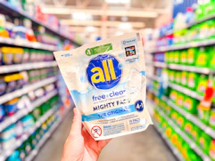 all detergent might pacs (19 count bag) held up in Walmart laundry aisle