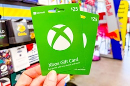 hand holding xbox gift cards