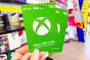 hand holding xbox gift cards