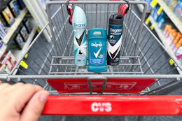 person pushing a cart with degree deodorant in it