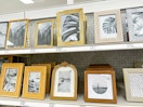 picture frames sitting on a target cart