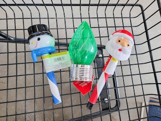 holiday stake lights in a cart