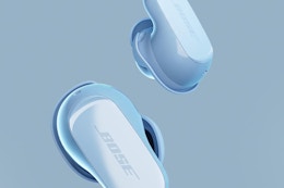 bose earbuds on a blue background