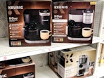 keurig k-duo coffee maker sitting on a target shelf