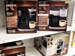 keurig k-duo coffee maker sitting on a target shelf