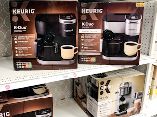 keurig k-duo coffee maker sitting on a target shelf