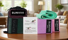 a set of resistance band set on a wooden table 