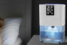 a dehumidifier on a nightstand