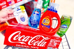 coca-cola, febreze, crest, tide, and dawn products in a cart