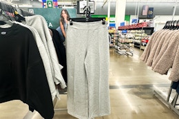 gray sweatpants hanging on display