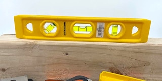 A self-leveling tool on a board