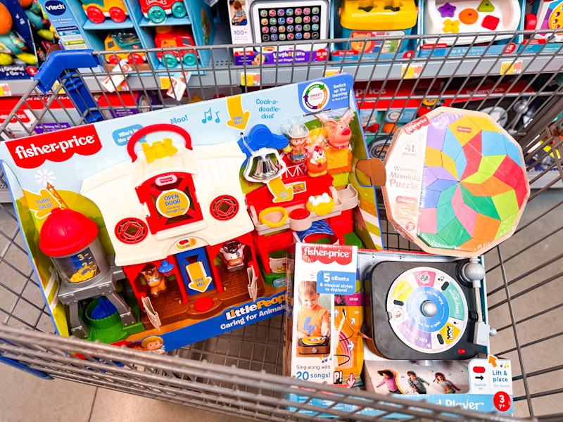 three fisher price toys in walmart cart