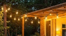 solar lights around the porch of a house
