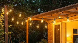 solar lights around the porch of a house