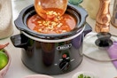 slow cooker with food inside