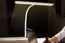 Airlonv LED Desk Lamp being used at a computer at night.
