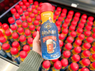 Harry Potter Coffee Creamer held up over other creamers in Walmart store
