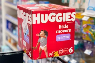 huggies boxed diapers on corner of shopping cart